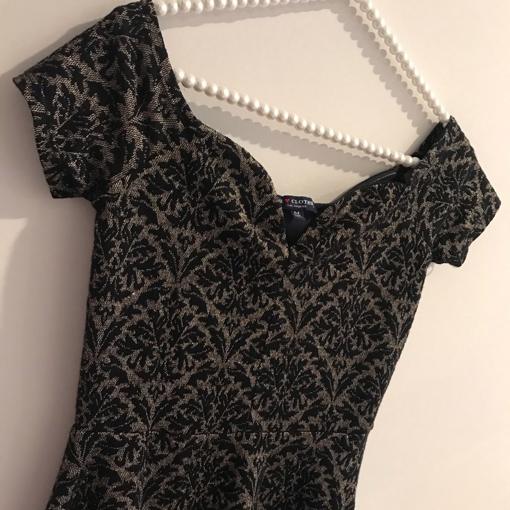 gold and black mini fit and flare dress